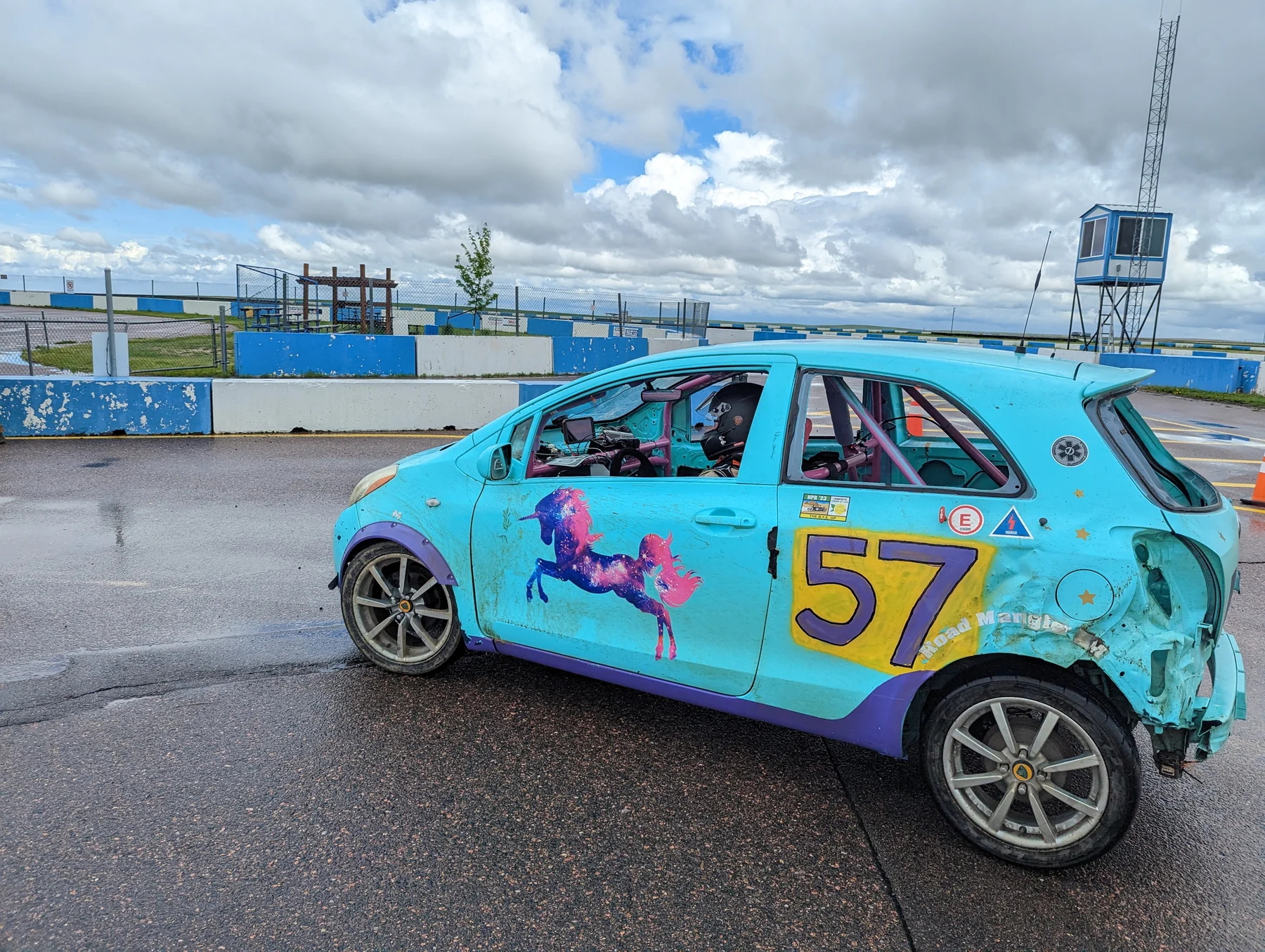 Turquoise number 57 Yaris photographed trackside
